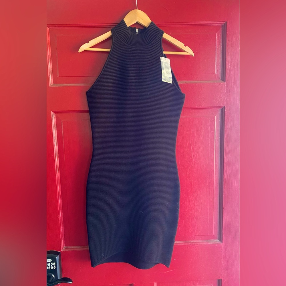 Torn by Ronny Kobo (NWT). Black Pencil dress. This is one sexy dress on!